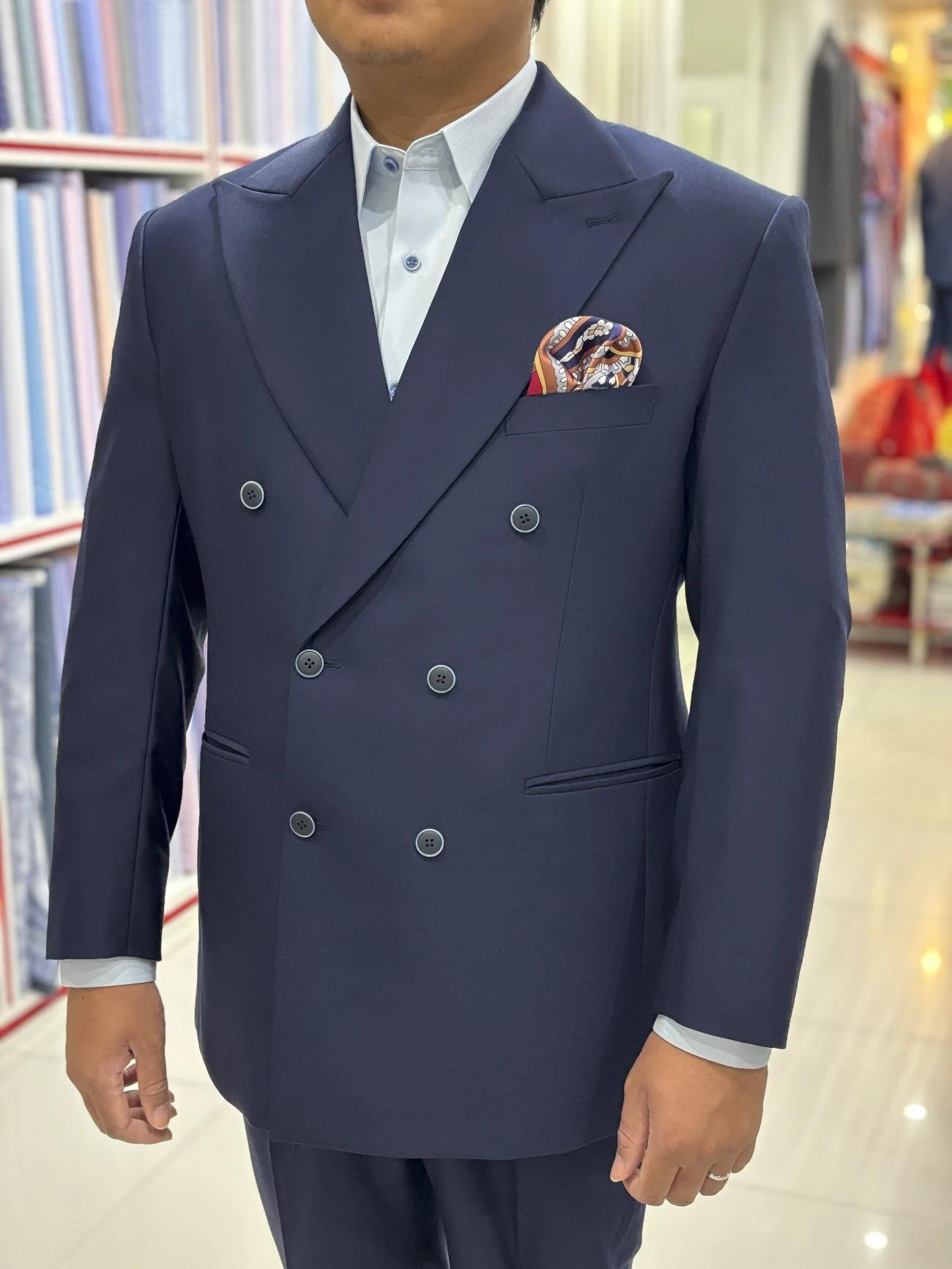 Jhasper Fashion review modern slim fit suit lifestyle shot Bangkok