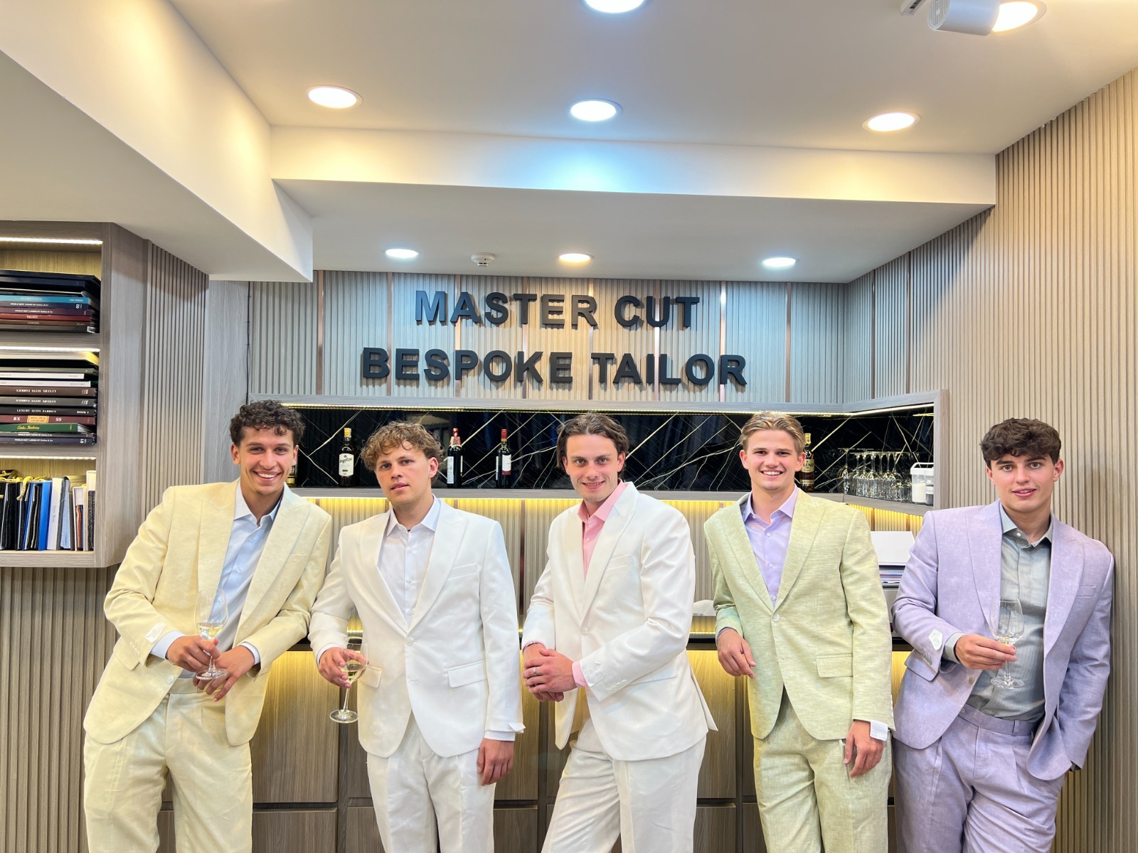 Master Cut Bespoke Tailor Bangkok - Silom Road shop interior with fabric books and fitting area